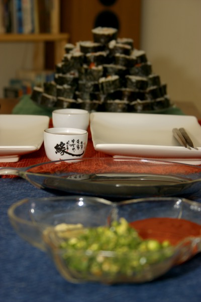 reflection of sushi mountain in soy sauce lake